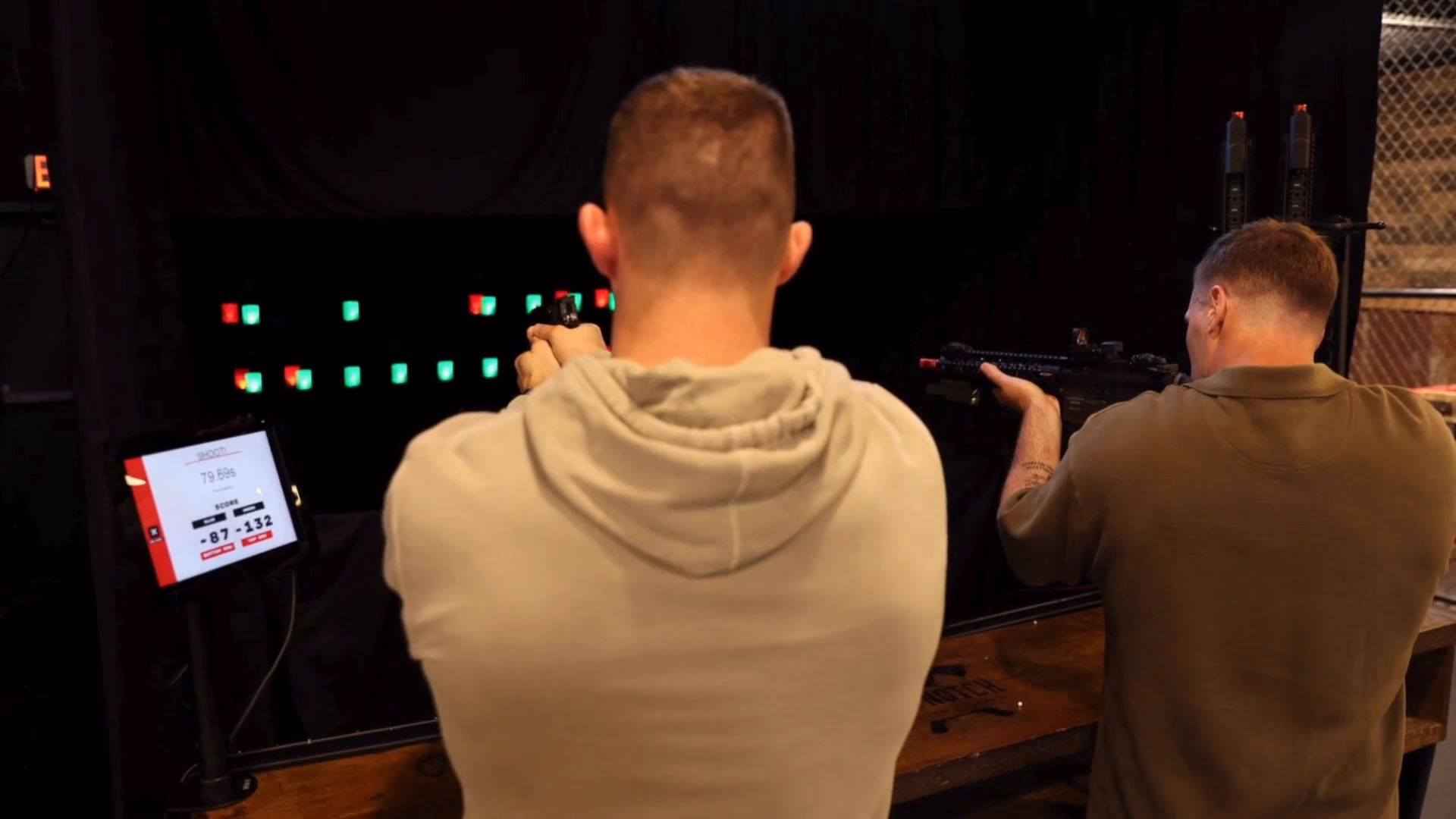 Guests playing in the interactive shooting lanes at Top Shot